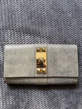 Vince Camuto White Pebbled Clutch with Gold Pyramid Accent